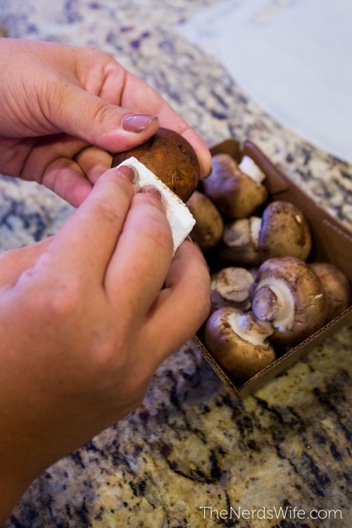 Clean mushrooms with paper towels. 