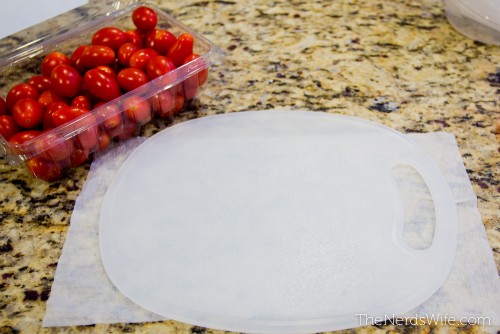 Place a damp paper towel under a cutting board to keep it from sliding.